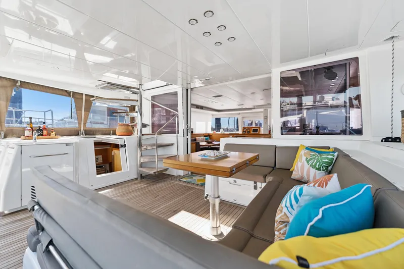 Slide: The Image of Luxurious interior of 2012 Lagoon 560 yacht with modern seating and vibrant cushions. - 51