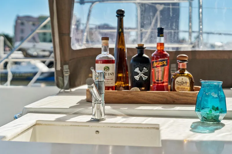 Slide: The Image of Luxury yacht Lagoon 560 (2012) with bar setup and sink on deck. - 52