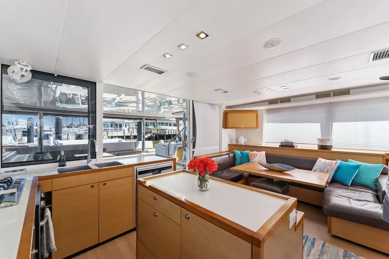 Slide: The Image of Luxurious interior of 2012 Lagoon 560 yacht with modern kitchen and cozy seating area. - 57