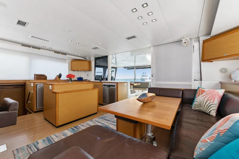 Slide: The Image of Luxurious interior of 2012 Lagoon 560 yacht with modern kitchen and cozy seating area. - 68