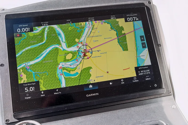 Slide: The Image of Garmin navigation display on a 2012 Lagoon 560 yacht, showing detailed nautical map. - 75