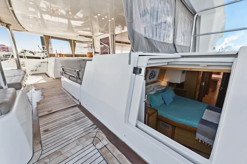 Slide: The Image of Luxurious 2012 Lagoon 560 yacht interior with cozy cabin and spacious deck area. - 79