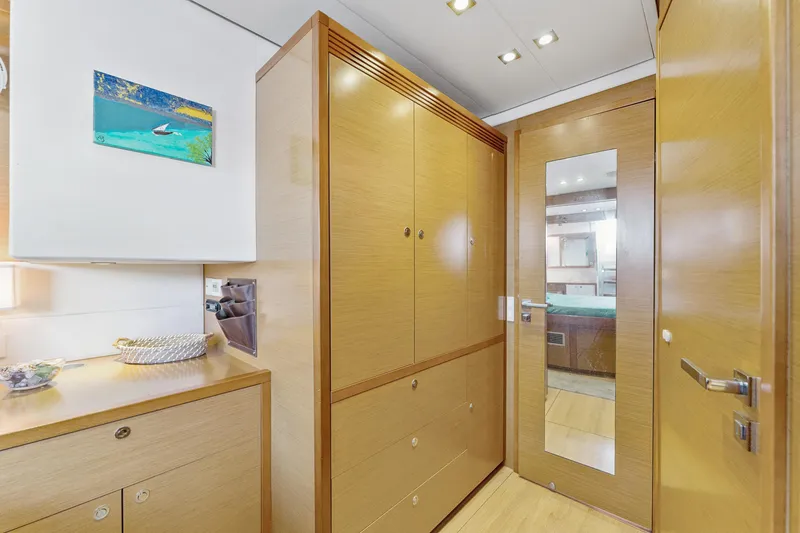 Slide: The Image of Luxurious interior of 2012 Lagoon 560 yacht with wooden cabinetry and modern decor. - 83