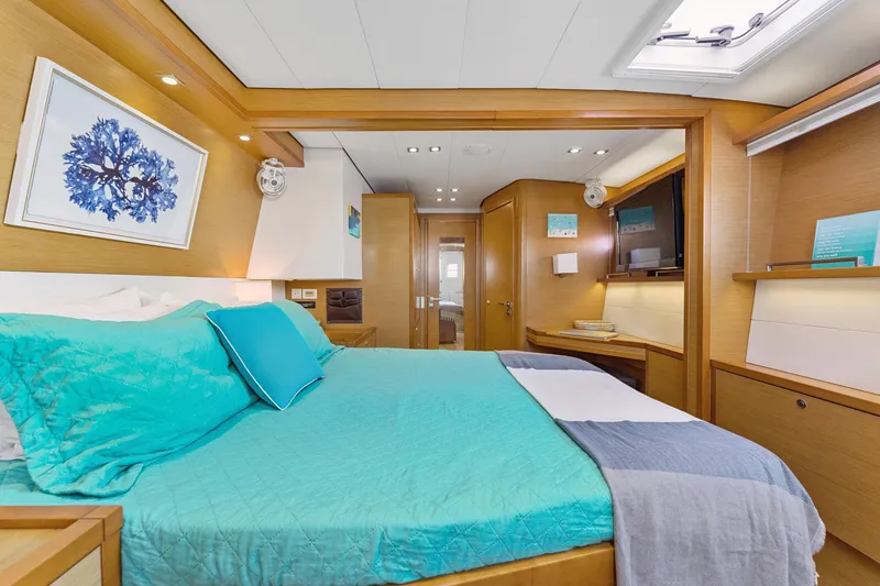 Slide: The Image of Luxurious interior of 2012 Lagoon 560 yacht with elegant bedroom and modern amenities. - 84
