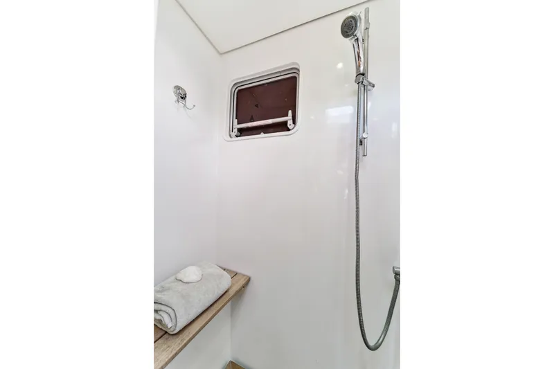 Slide: The Image of Shower area in 2012 Lagoon 560 yacht, featuring a sleek design and modern fixtures. - 96