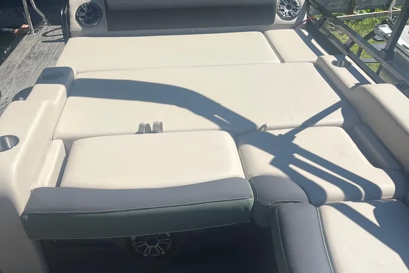 Slide: The Image of 2026 Avalon 25 LSZ Versatile Rear Lounger with spacious seating and cup holders. - 5