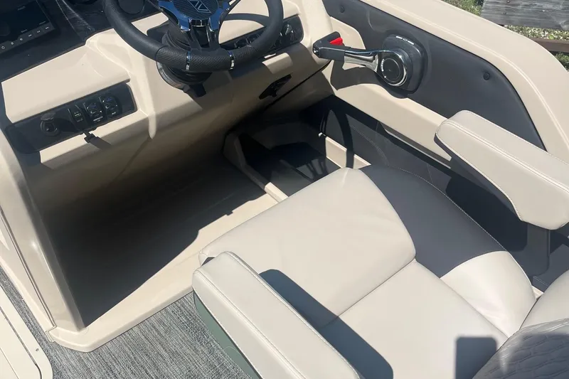 Slide: The Image of 2026 Avalon 25 LSZ Versatile Rear Lounger cockpit with steering wheel and control panel. - 6