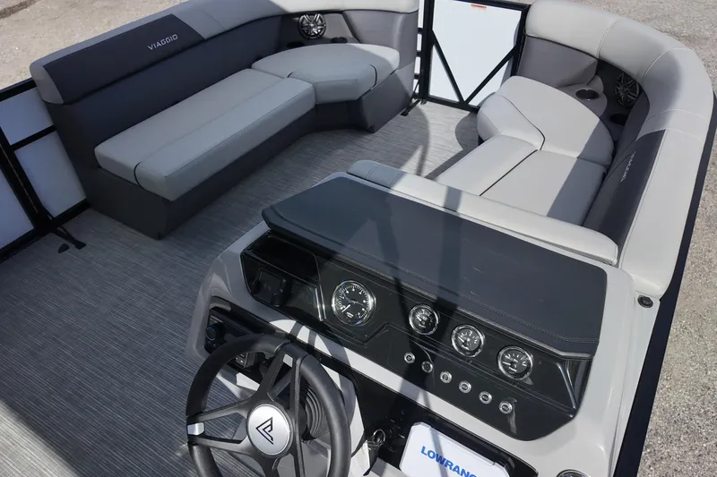Slide: The Image of 2026 Viaggio Lago V 20 C pontoon boat interior with modern seating and dashboard. - 12