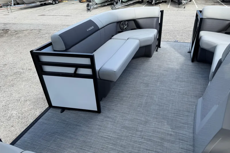 Slide: The Image of 2026 Viaggio Lago V 20 C boat interior with gray seating and flooring. - 15