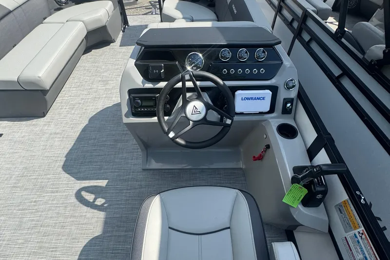 Slide: The Image of Interior of 2026 Viaggio Lago V 20 C boat with steering console and seating. - 8