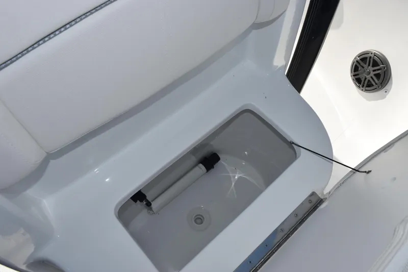 Slide: The Image of 2026 Sea Hunt BX 22 BR boat storage compartment with speaker detail. - 15