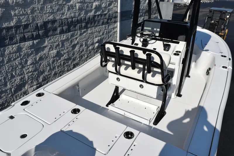 Slide: The Image of 2026 Sea Hunt BX 22 BR boat interior with seating and steering console. - 6
