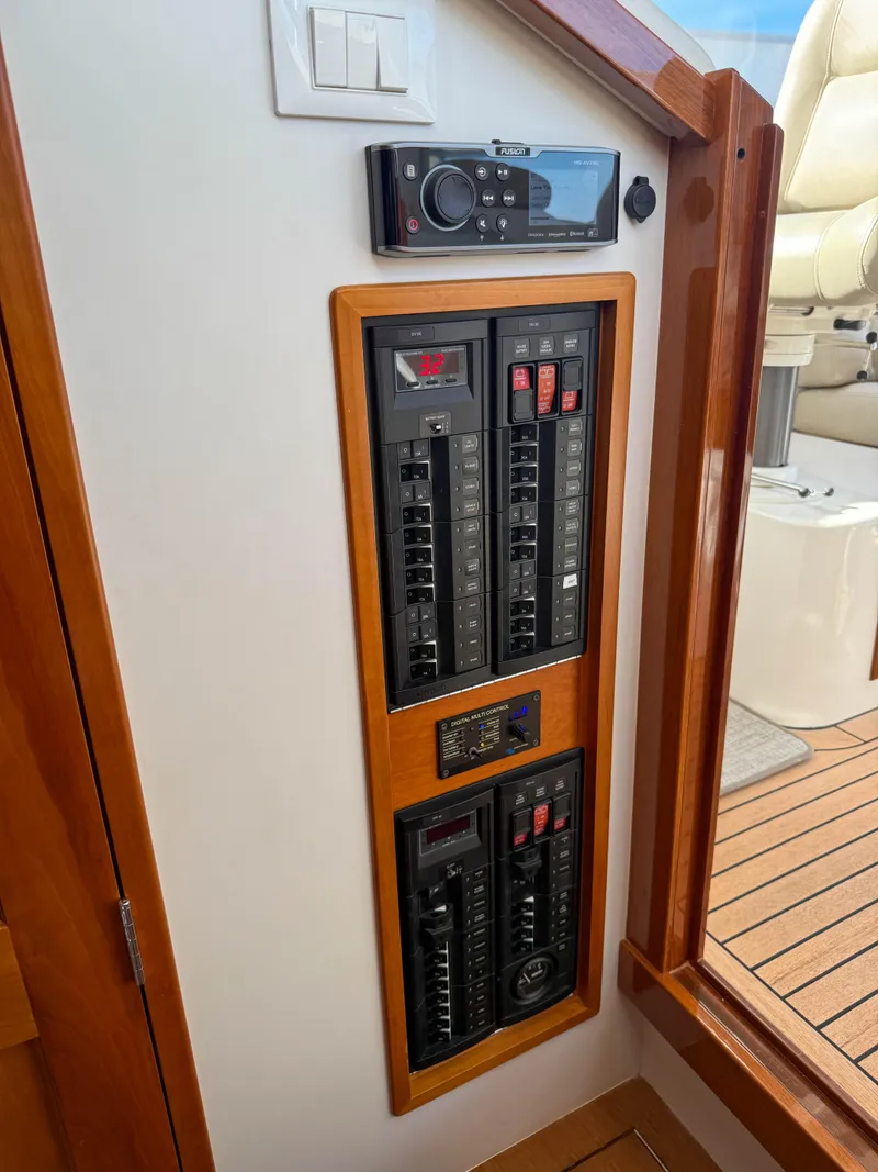 Slide: The Image of Electrical panel on 2015 MJM 36z Downeast boat with wooden trim. - 39
