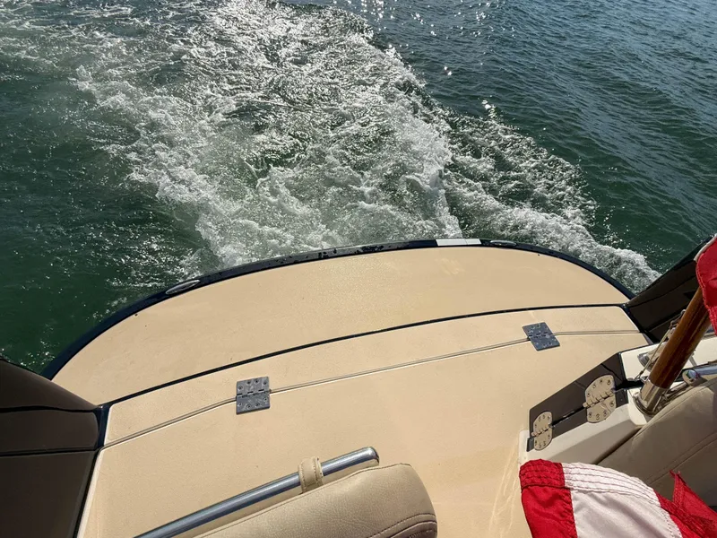 Slide: The Image of 2015 MJM 36z Downeast boat stern view on water. - 47