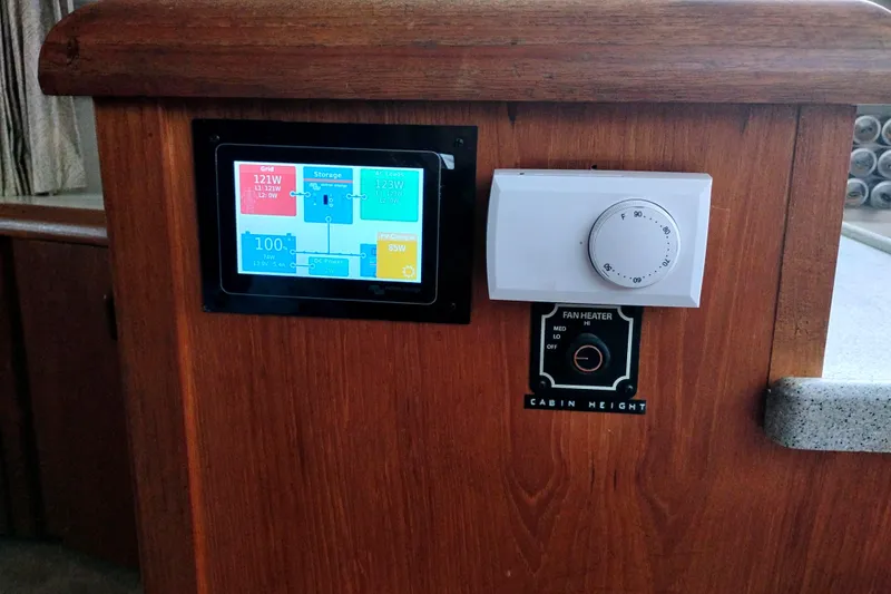 Slide: The Image of Control panel and thermostat on 1991 Californian 52 Cockpit Motor Yacht interior. - 24