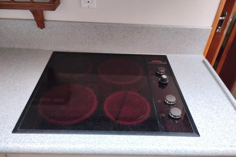Slide: The Image of Electric stovetop on a 1991 Californian 52 Cockpit Motor Yacht kitchen counter. - 32