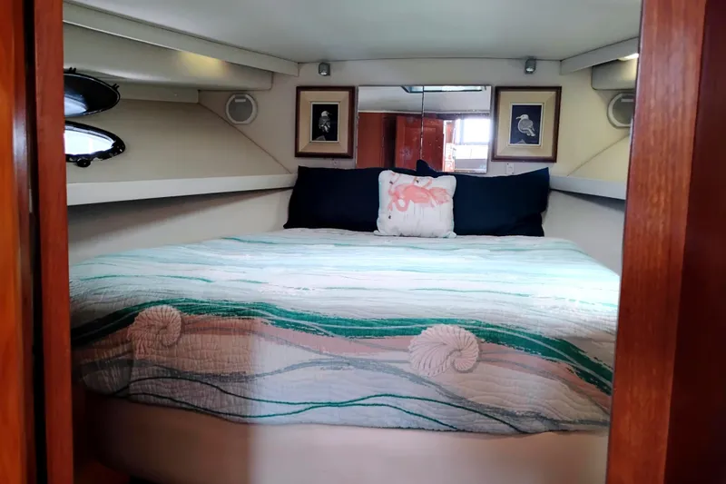 Slide: The Image of Cozy bedroom in 1991 Californian 52 Cockpit Motor Yacht with nautical decor. - 37
