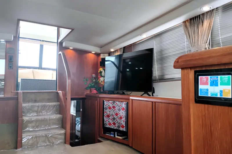 Slide: The Image of Luxurious interior of 1991 Californian 52 Cockpit Motor Yacht with modern amenities. - 44