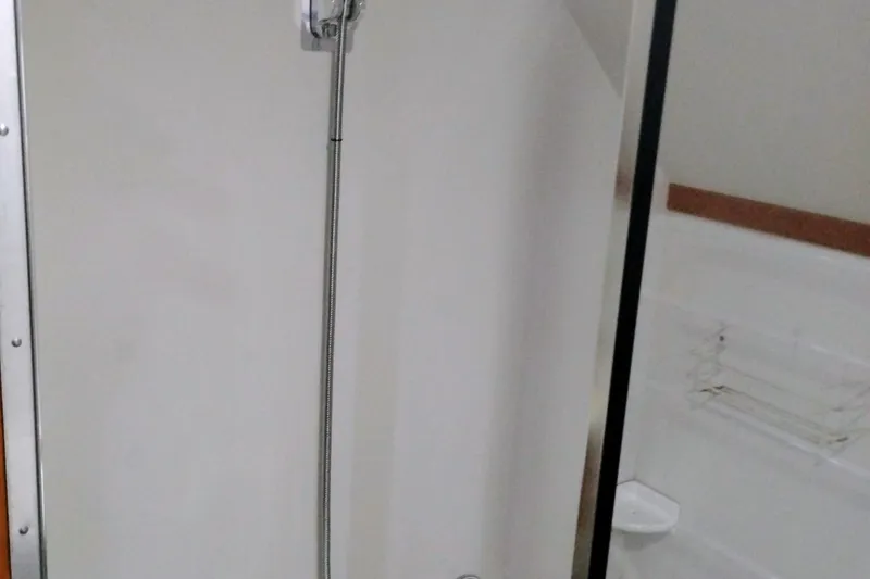 Slide: The Image of Shower area in 1991 Californian 52 Cockpit Motor Yacht bathroom. - 55