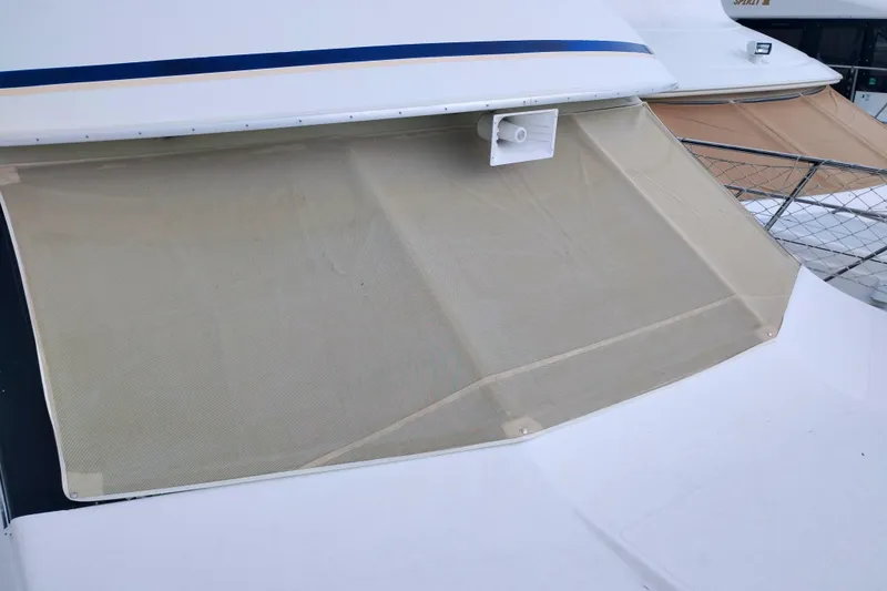 Slide: The Image of 1991 Californian 52 Cockpit Motor Yacht with beige sunshade on deck. - 59