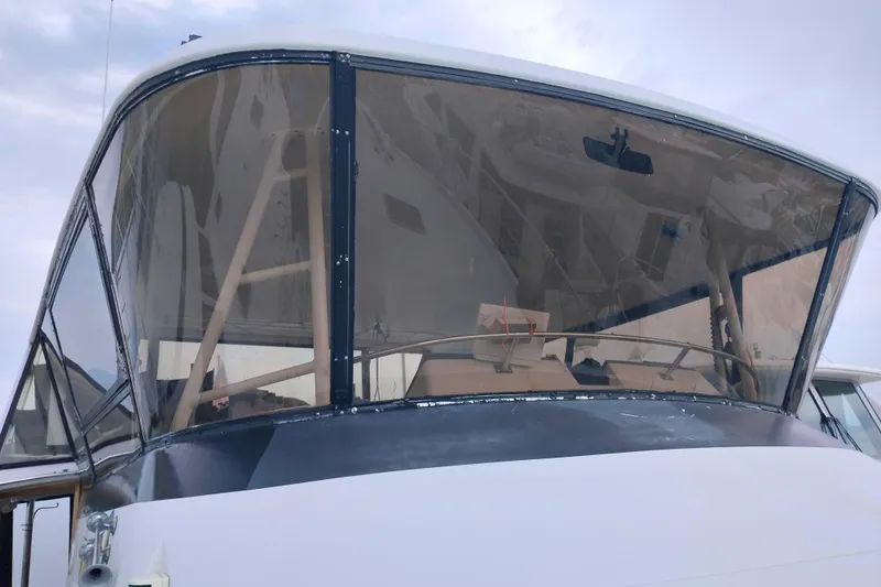 Slide: The Image of 1991 Californian 52 Cockpit Motor Yacht with enclosed cockpit and clear windows. - 61