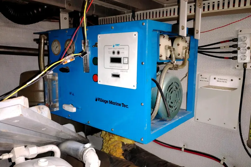 Slide: The Image of Engine room of 1991 Californian 52 Cockpit Motor Yacht with water quality monitor. - 62