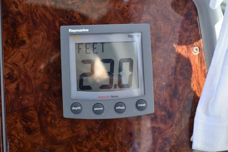 Slide: The Image of Raymarine depth gauge showing 23.0 feet on a 2005 Formula 37 PC boat. - 19