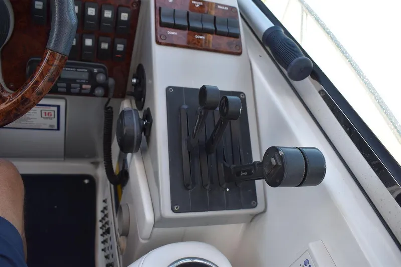 Slide: The Image of 2005 Formula 37 PC boat control panel with throttle and switches. - 20