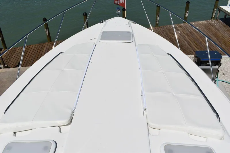 Slide: The Image of 2005 Formula 37 PC yacht bow with sun pads and railing. - 23