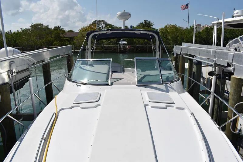 Slide: The Image of 2005 Formula 37 PC yacht docked at marina, front deck view. - 25