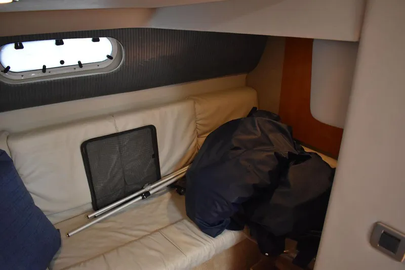 Slide: The Image of Interior cabin of a 2005 Formula 37 PC yacht with sofa and window. - 31