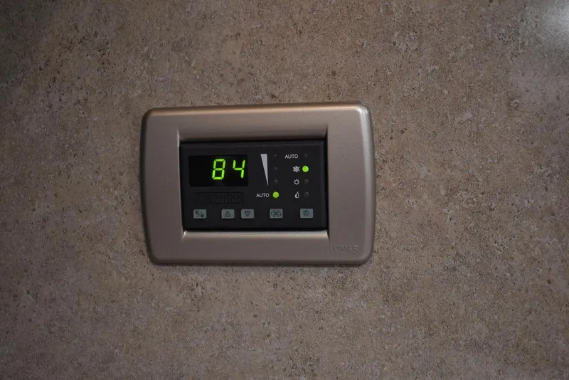 Slide: The Image of Digital thermostat display in a 2005 Formula 37 PC boat. - 46