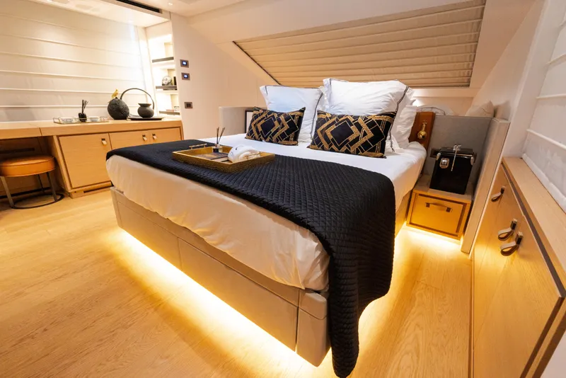 Slide: The Image of Luxurious Sanlorenzo SL96 yacht bedroom with elegant decor and ambient lighting, 2021 model. - 11
