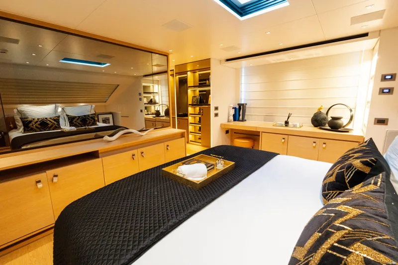 Slide: The Image of Luxurious Sanlorenzo SL96 2021 yacht bedroom with elegant decor and modern furnishings. - 13