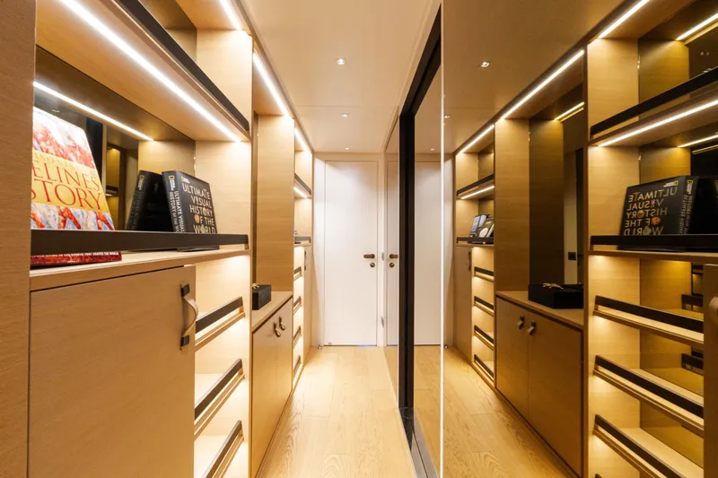 Slide: The Image of Luxurious interior of 2021 Sanlorenzo SL96 yacht with elegant wooden cabinetry and ambient lighting. - 15