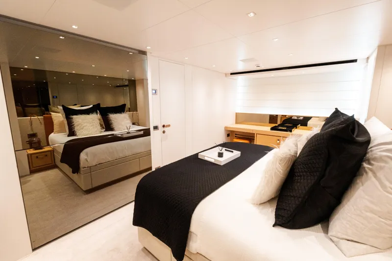 Slide: The Image of Luxurious bedroom interior of 2021 Sanlorenzo SL96 yacht with elegant bedding and modern decor. - 24