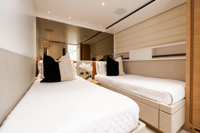 Slide: The Image of Luxurious twin bedroom on 2021 Sanlorenzo SL96 yacht, featuring elegant decor and modern design. - 25