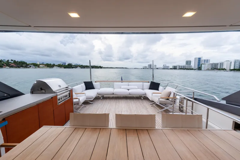 Slide: The Image of Luxurious 2021 Sanlorenzo SL96 yacht deck with modern seating and ocean view. - 40