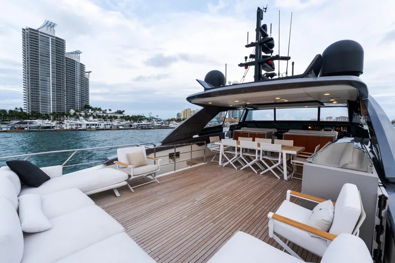 Slide: The Image of Luxurious 2021 Sanlorenzo SL96 yacht deck with modern seating and ocean view. - 48