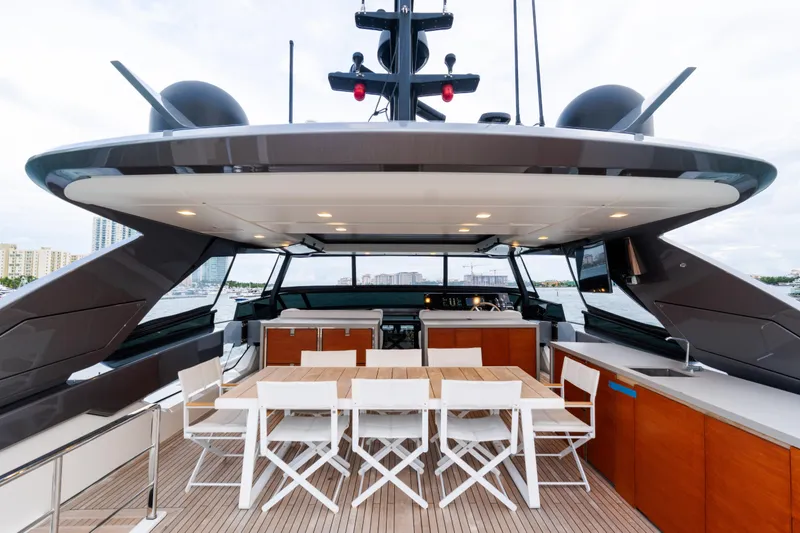 Slide: The Image of Luxurious 2021 Sanlorenzo SL96 yacht deck with dining area and modern amenities. - 49