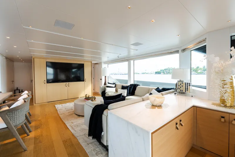 Slide: The Image of Luxurious interior of 2021 Sanlorenzo SL96 yacht with modern furnishings and large windows. - 6