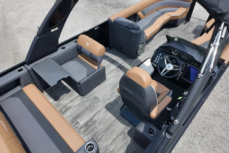 Slide: The Image of Luxurious interior of 2026 Viaggio Diamante 24 S boat with elegant seating and modern dashboard. - 11