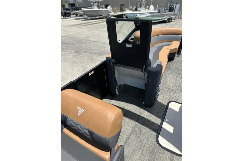 Slide: The Image of 2026 Viaggio Diamante 24 S boat interior with tan and gray seating. - 19
