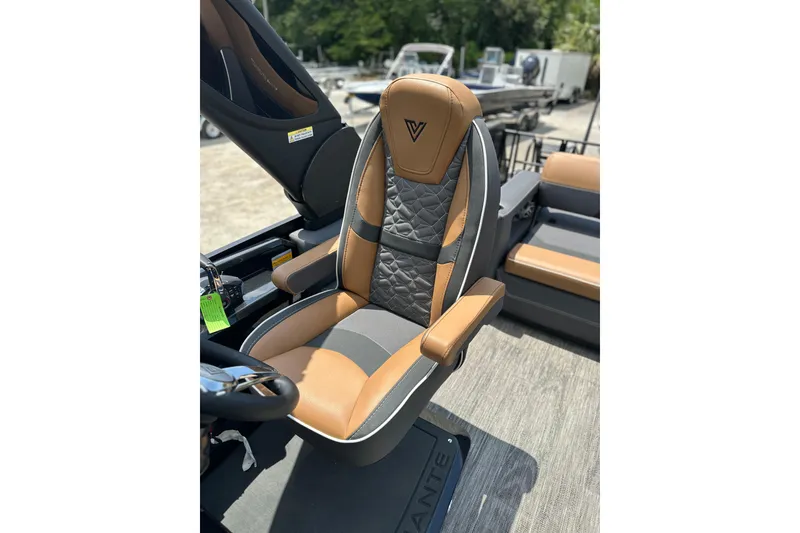 Slide: The Image of Luxurious seating in 2026 Viaggio Diamante 24 S boat, featuring tan and gray upholstery. - 20