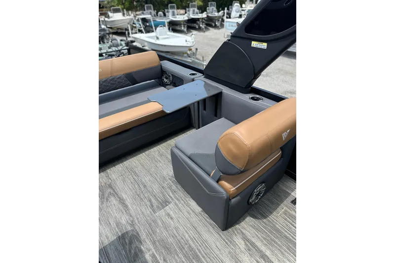 Slide: The Image of 2026 Viaggio Diamante 24 S boat interior with tan and gray seating, modern design. - 23