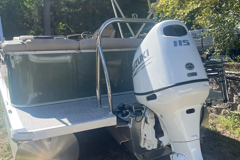 Slide: The Image of 2026 Avalon 21 LSZ Cruise pontoon boat with Suzuki 115 outboard motor. - 8