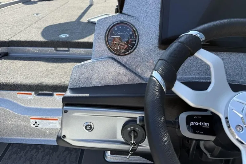 Slide: The Image of 2026 Nitro Z20 XL Pro boat dashboard with steering wheel and gauges. - 12