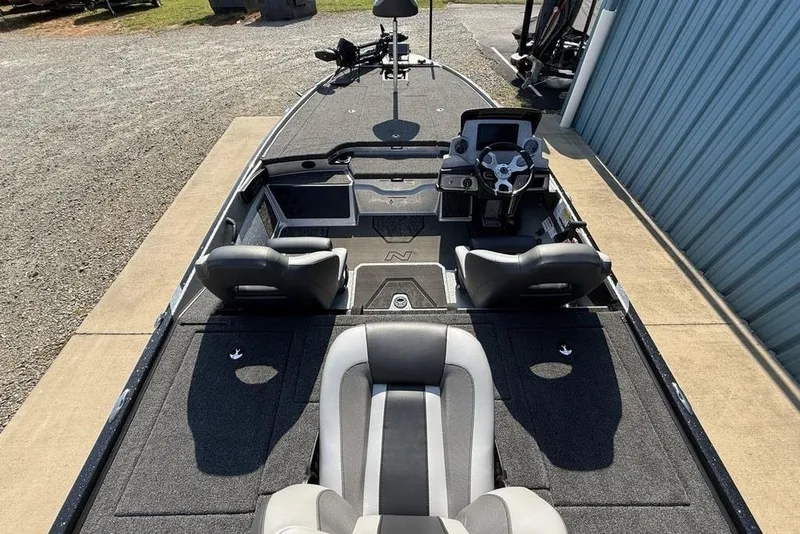 Slide: The Image of 2026 Nitro Z20 XL Pro boat interior with steering console and seating. - 19