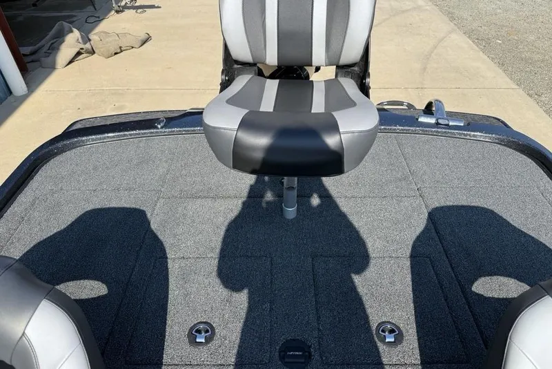 Slide: The Image of 2026 Nitro Z20 XL Pro boat with gray and black seating on a carpeted deck. - 20