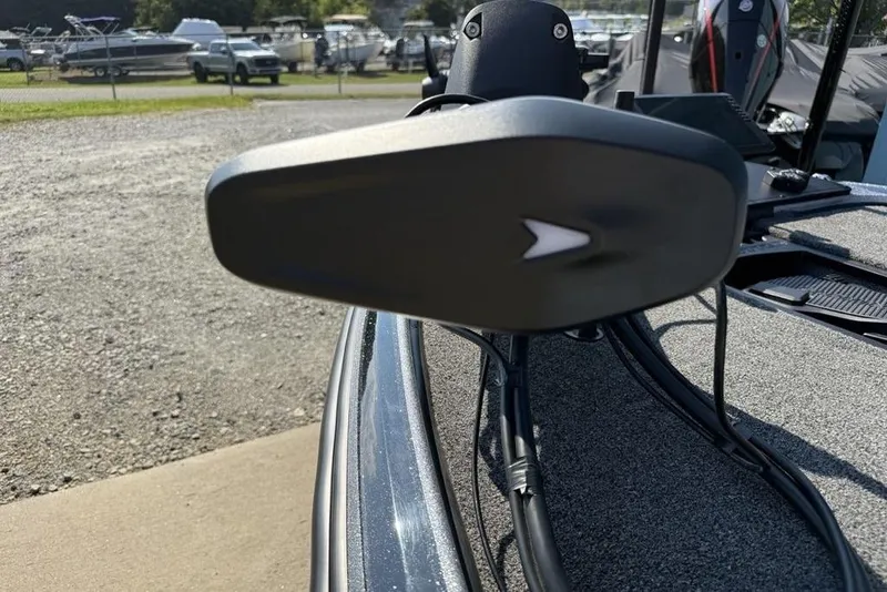 Slide: The Image of 2026 Nitro Z20 XL Pro boat detail with motor and deck in a marina setting. - 4